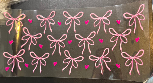Pink bows with hearts