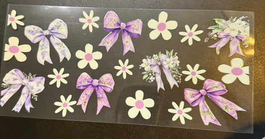 Purple bows with flowers